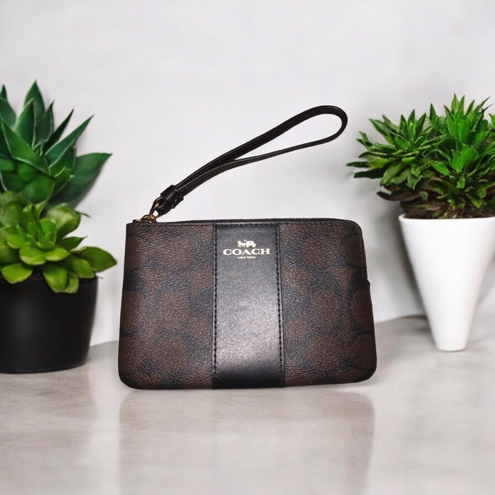 15. COACH Brown/Black Coated Leather Wristlet